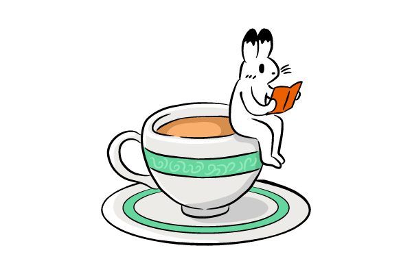 コップの縁で読書するウサギ