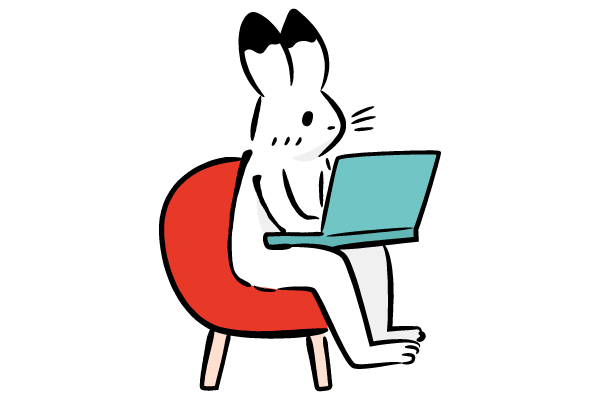 ノートパソコンでお仕事するウサギ